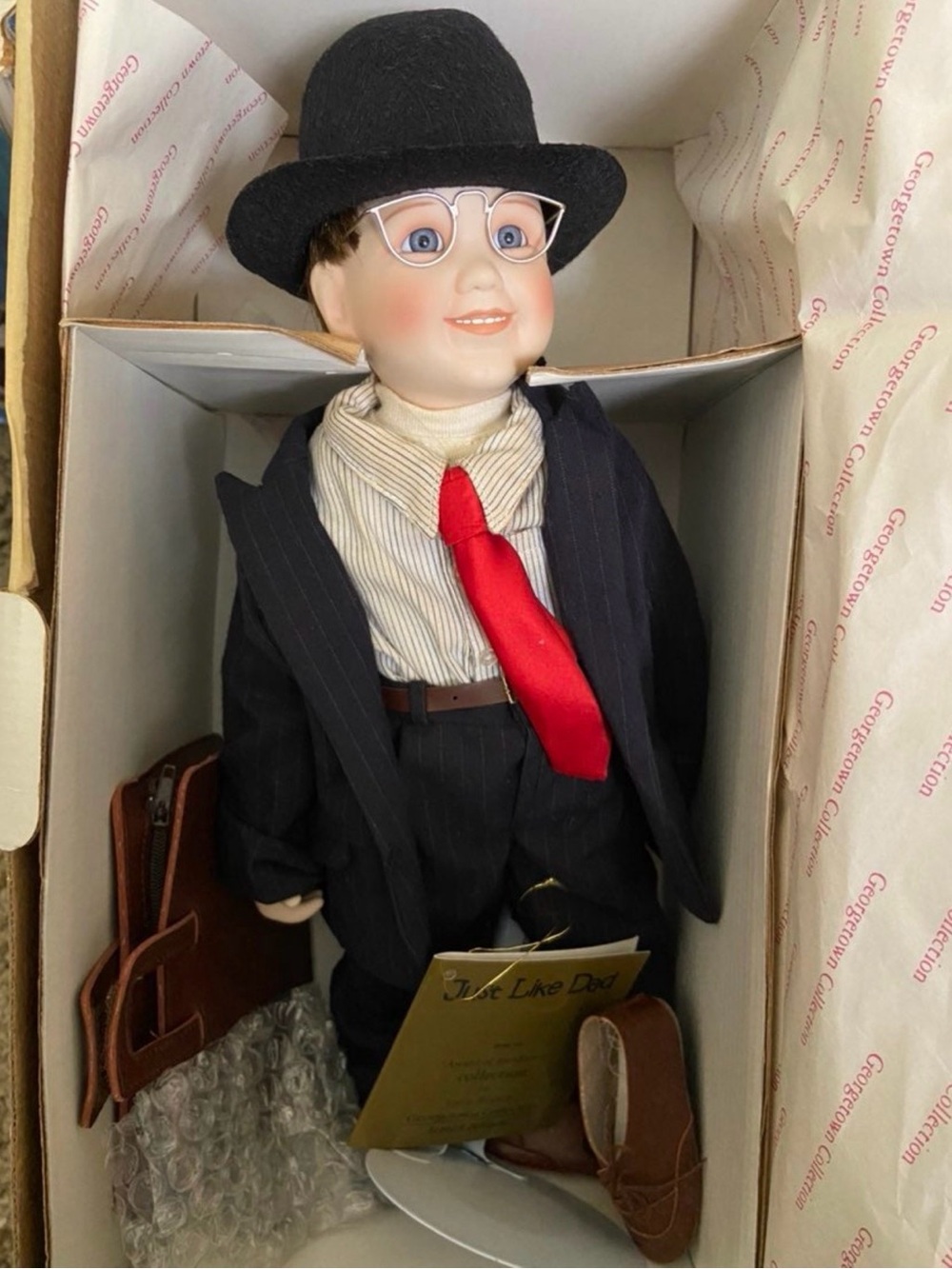 Porcelain Doll/Black Suit “Just like dad”Joyce Reavy, Georgetown collection